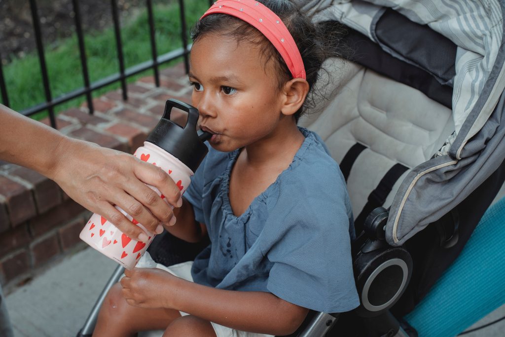 child drinks water